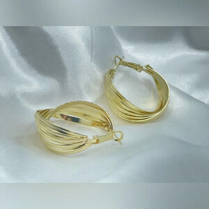 Golden twisted hoop earrings